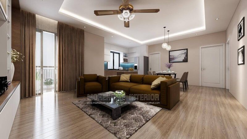 Không gian phòng khách chính được nhấn mạnh bởi bộ sofa vải kết hợp với chiếc bàn đá nhân tạo màu đen tinh tế.